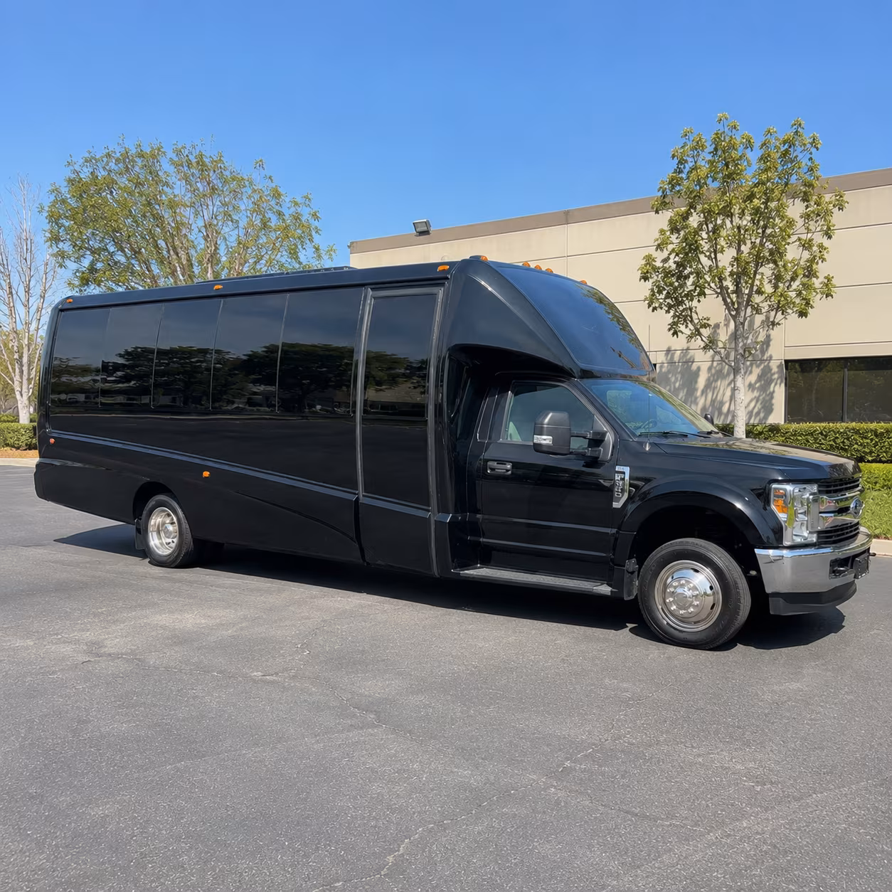 Friends laughing during a party bus celebration in Hayward
