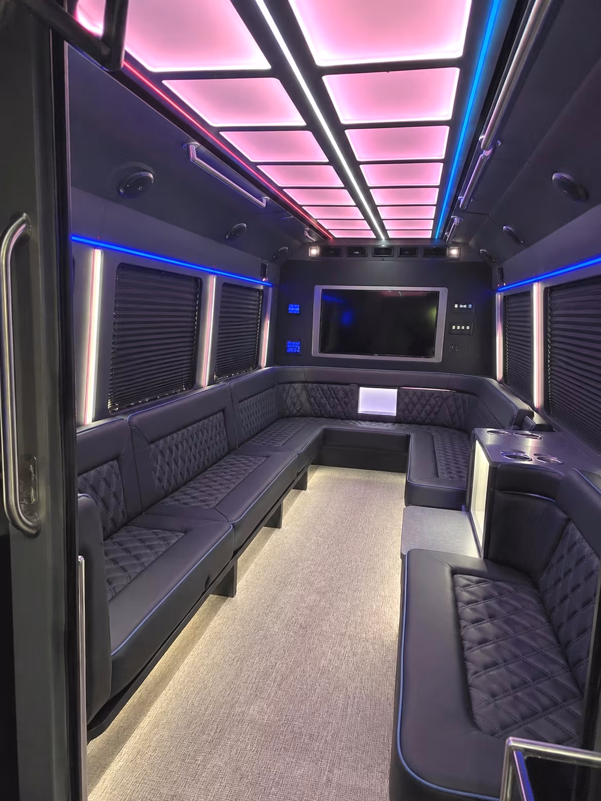 Wedding guests seated inside a party bus serving Hayward